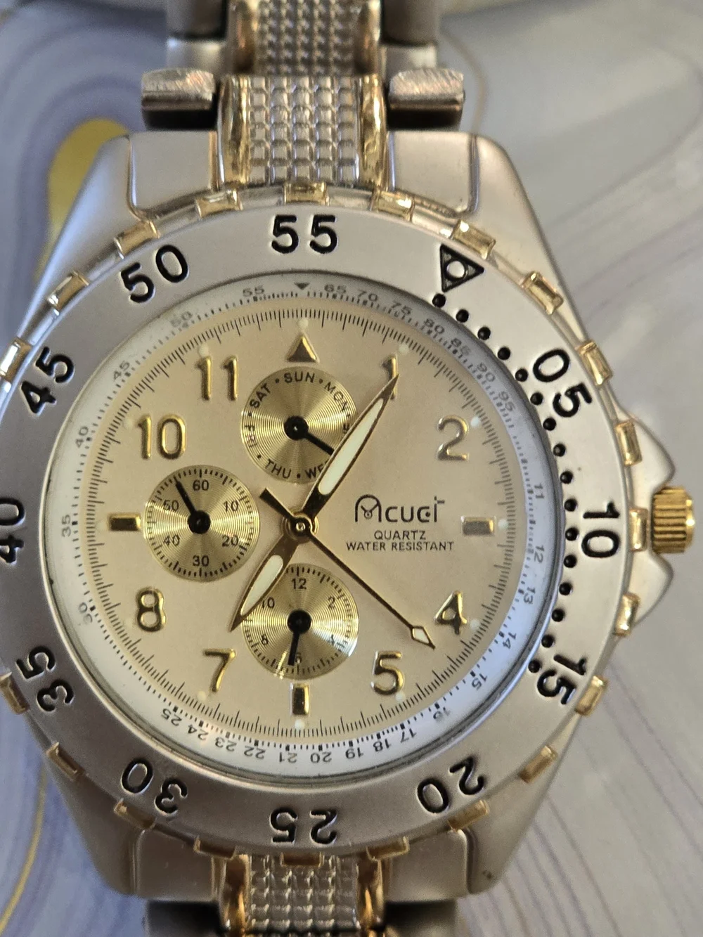 mcuci gold tone